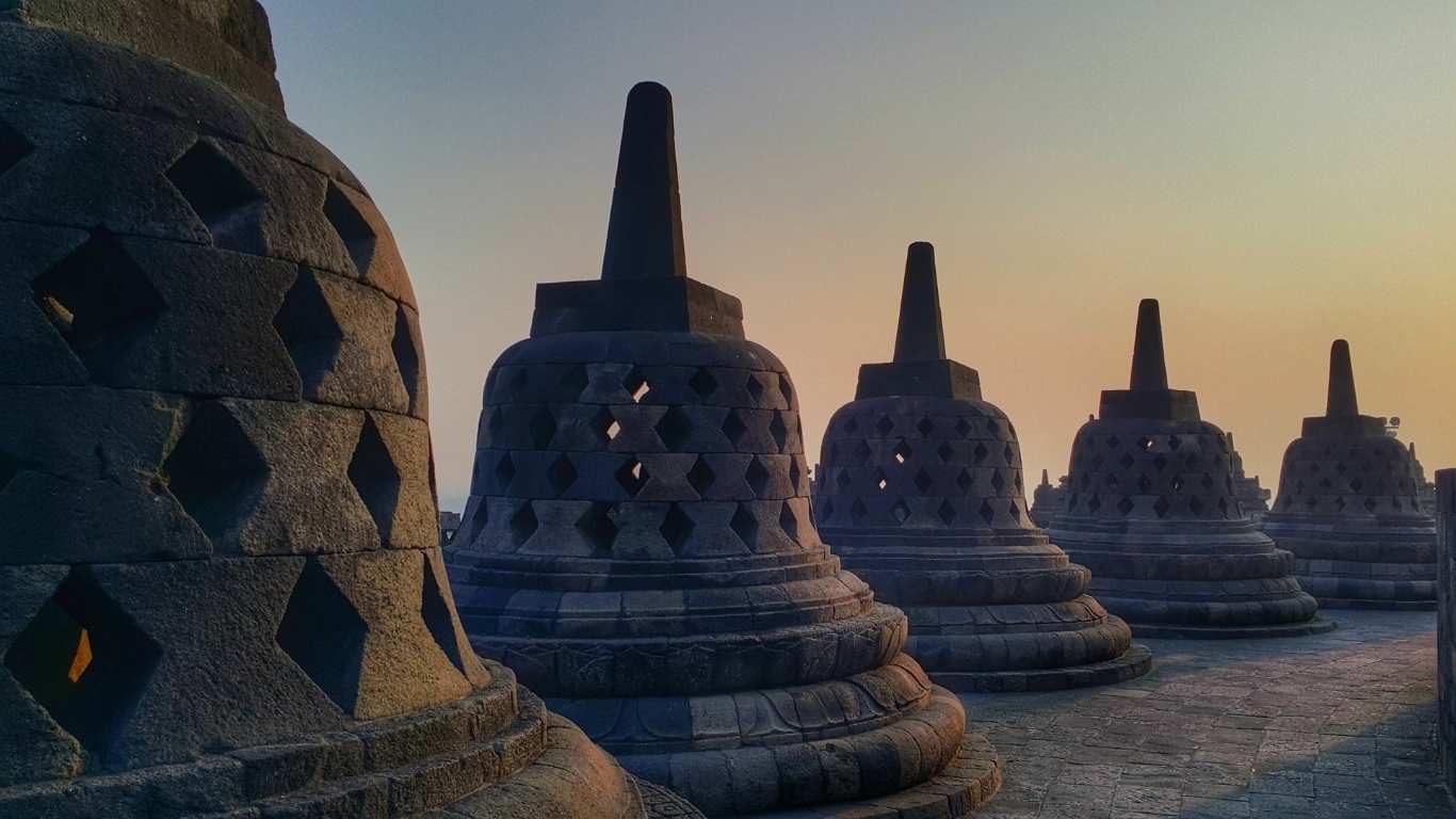 Exploring borobudur temple at sunrise